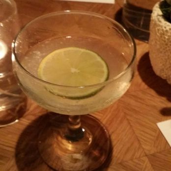 Viviane - Isobel's Gin Gimlet $9 - already got the party started, lol! Looks tasty! Daiquiri ($8) drink not pictured. My phone was charging by then... - New American Near Me - Beverly Hills, California