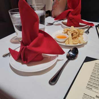 Monsoon Bistro - Nicely folded red napkins sitting on our personal plates - Asian Fusion Near Me - Holyoke, Massachusetts Monsoon Bistro - Nicely folded red napkins sitting on our personal plates - Asian Fusion Near Me - Holyoke, Massachusetts