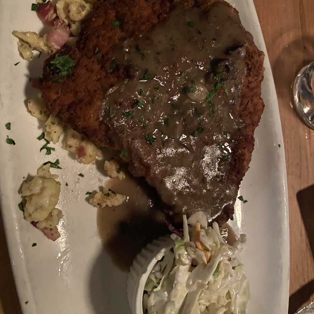 Pork schnitzel & slaw on spaetzel Pork schnitzel & slaw on spaetzel