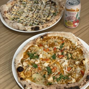 Hapa Pizza - Massaman Curry Pizza (front) and Pho Pizza (back) - Pizza Near Me - Beaverton, Oregon Hapa Pizza - Massaman Curry Pizza (front) and Pho Pizza (back) - Pizza Near Me - Beaverton, Oregon