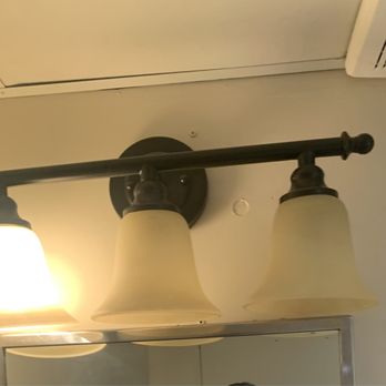 Padelford Riverboats - Men's Bathroom Lights. Only One Bulb Lit. - Boat Charters Near Me - Saint Paul, Minnesota