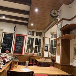 Burger's Bohrerhof - Burger's Bohrerhof, interior dining room & menus on wall