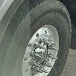 Dan Jones Conveyor Trucks - Extremely unsafe choice by this company to have spiked wheels on their truck.