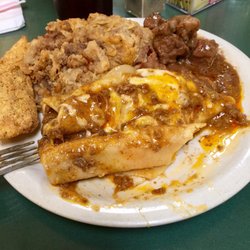 Queen's Garden Restaurant - Buffet items....enchiladas, chicken fried steak, and carne guisada.