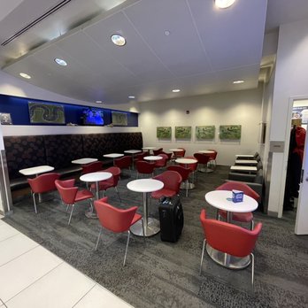 Delta Sky Club - Seating area across from the snack bar - Airport Lounges Near Me - Philadelphia, Pennsylvania Delta Sky Club - Seating area across from the snack bar - Airport Lounges Near Me - Philadelphia, Pennsylvania