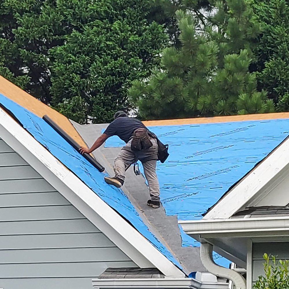 Slide of East coast Roofing & Services