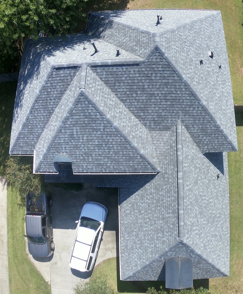Slide of Pinnacle Exteriors Roofing