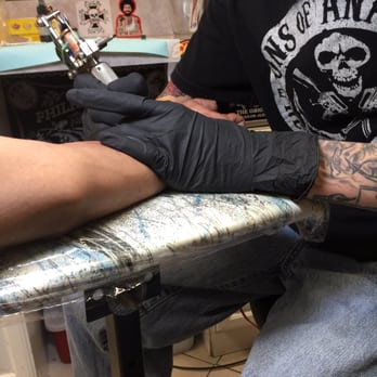 Tiny Tim's Boulevard Tattoo - Getting the lettering done. - Tattoo Near Me - Collingdale, Pennsylvania Tiny Tim's Boulevard Tattoo - Getting the lettering done. - Tattoo Near Me - Collingdale, Pennsylvania