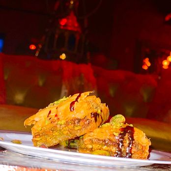 Amoré Hookah Lounge - a plate of food on a table - Hookah Bars Near Me - Mckinney, Texas Amoré Hookah Lounge - a plate of food on a table - Hookah Bars Near Me - Mckinney, Texas