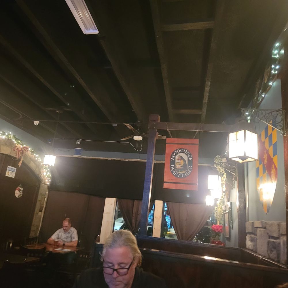 Union Jack's - a man sitting at a table - Pubs Near Me - Knoxville, Tennessee Union Jack's - a man sitting at a table - Pubs Near Me - Knoxville, Tennessee