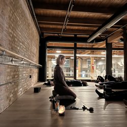 Grow Well Yoga + Barre + Fitness - Mare teaching Restorative Yoga at Grow Well Yoga in Naperville.
