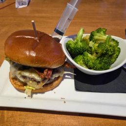Hotshot burger with a side of broccoli Hotshot burger with a side of broccoli