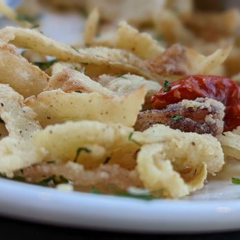 Grassa - a plate of pasta with meat and vegetables - Italian Near Me - Portland, Oregon Grassa - a plate of pasta with meat and vegetables - Italian Near Me - Portland, Oregon