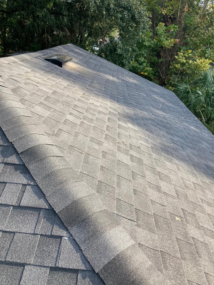 Slide of Payless Roofing