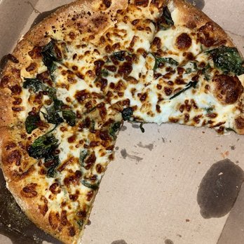 Domino's Pizza - a half eaten pizza in a box - Pizza Near Me - Pawtucket, Rhode Island