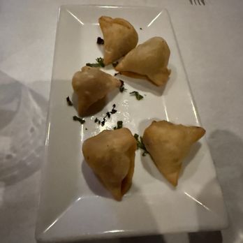 Indigma - a Modern Indian Bistro - Mini Vegetable samosas (5) comes with chutney - Indian Near Me - Baltimore, Maryland Indigma - a Modern Indian Bistro - Mini Vegetable samosas (5) comes with chutney - Indian Near Me - Baltimore, Maryland