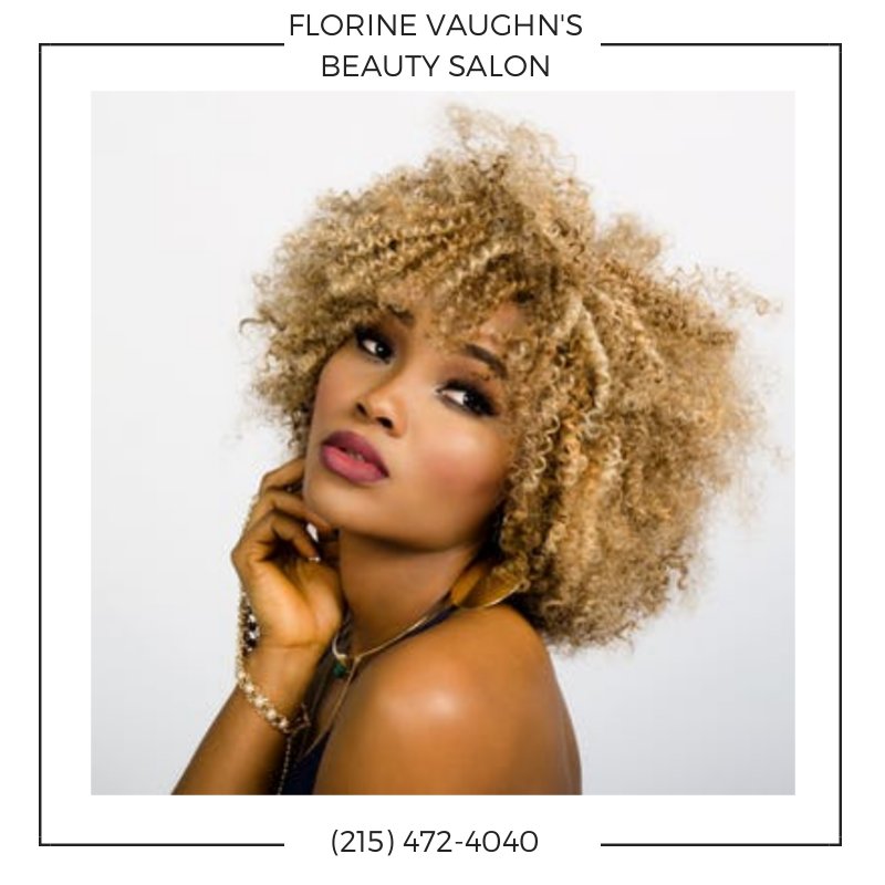 Florine Vaughn's Beauty Salon Logo