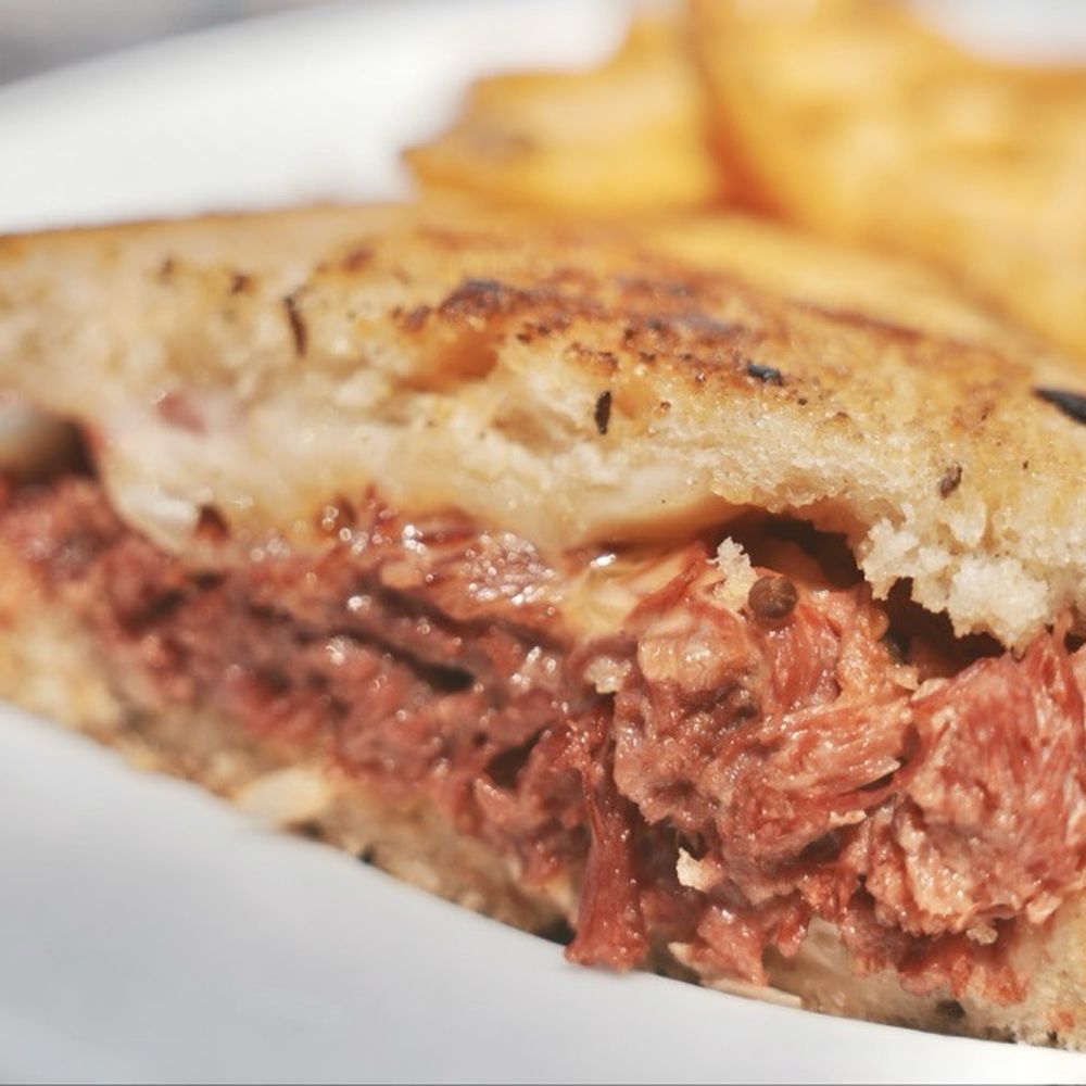 The Grill At Torrey Pines - Reuben Sandwich. One of the best I've had. Corned beef is tender, melted cheese, sauerkraut adds a sharp tang, & buttery toasted rye bread. - New American Near Me - La Jolla, California The Grill At Torrey Pines - Reuben Sandwich. One of the best I've had. Corned beef is tender, melted cheese, sauerkraut adds a sharp tang, & buttery toasted rye bread. - New American Near Me - La Jolla, California