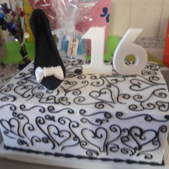 Cinderella Cakes - Sweet 16 birthday cake. Shoebox designed with a high heel on top. - Desserts Near Me - Anaheim, California Cinderella Cakes - Sweet 16 birthday cake. Shoebox designed with a high heel on top. - Desserts Near Me - Anaheim, California