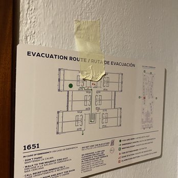 Iberostar Waves Paraíso del Mar - Cheap tape holding up the emergency map on the wall - Resorts Near Me - Punta Maroma, ROO