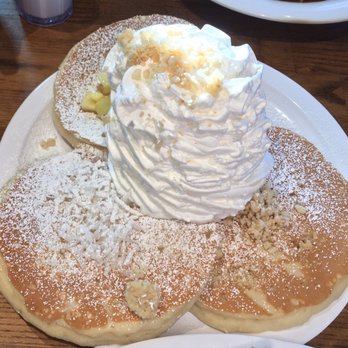 Eggs 'n Things Ko Olina - Hawaiian Whipped Cream Pancake sampler includes pineapple, macadamia nut and coconut pancakes - American Near Me - Kapolei, Hawaii Eggs 'n Things Ko Olina - Hawaiian Whipped Cream Pancake sampler includes pineapple, macadamia nut and coconut pancakes - American Near Me - Kapolei, Hawaii