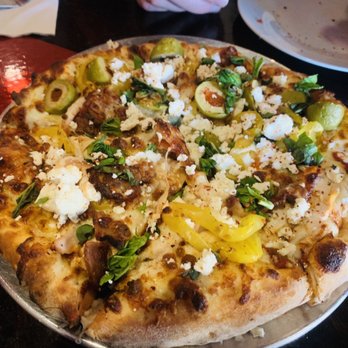 Tisano's Garlic Grill - Custom pizza. Chicken, feta,pepperoncinis, green olive, bacon, fresh basil. - Italian Near Me - Niceville, Florida