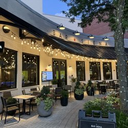 Evening view of their back patio and mall entrance.