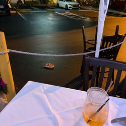Giannis Italian Restaurant - Trash in front of our table.
