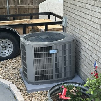 Infinity AC of Austin - AC condenser in backyard - Heating & Air Conditioning/HVAC Near Me Infinity AC of Austin - AC condenser in backyard - Heating & Air Conditioning/HVAC Near Me