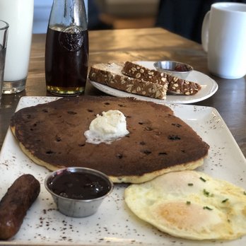First Watch - Tri-Fecta. Two over-medium eggs, multigrain blueberry pancake, and sausage. Added a side of multigrain artisan toast. - Breakfast & Brunch Near Me - Worthington, Ohio