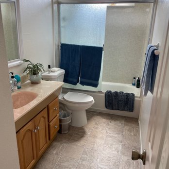 OC Tidy Maids - Cleaned floor, tub, shower doors, mirrors, toilet, and counter top - Home Cleaning Near Me