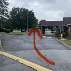 White Elephant - Stay to the left and go behind this portico.