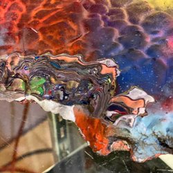 Lile Art Gallery - A chunk of paint from the Cadillacs in Cadillac Ranch that is made into "Cadilite" jewelry!