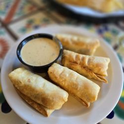 Mini chicken chimis and queso