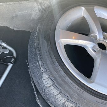 The Sharpest Rides - My blown tire - Car Dealers Near Me - Englewood, Colorado