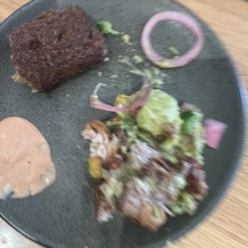 Cafe Con Leche - Tostones topped with pork and avocado sauce and pickled onion - Coffee & Tea Near Me - Wappingers Falls, New York