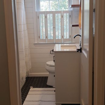 Pro Handyman - a bathroom with a sink and toilet - Carpenters Near Me - Reisterstown, Maryland