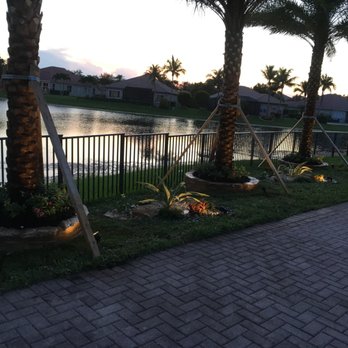 Jose Landscaping - a view of a lake and palm trees - Tree Services Near Me Jose Landscaping - a view of a lake and palm trees - Tree Services Near Me