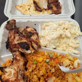 Don Julio’s BBQ - Half chicken with pork fried rice - Latin American Near Me - West New York, New Jersey