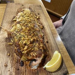 Rico's Cafe & Pizzeria - White fish dinner with baked potato and broccoli