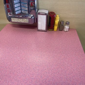 Peggy Sue's - On each table is a mini jukebox - Burgers Near Me - Kihei, Hawaii Peggy Sue's - On each table is a mini jukebox - Burgers Near Me - Kihei, Hawaii