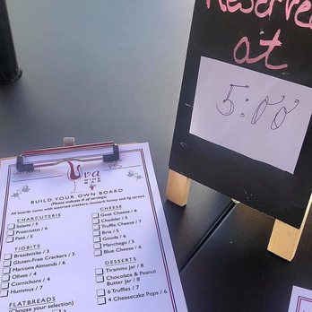 Uva Wine Bar - Menu and reserved table sign - Wine Bars Near Me - Plymouth, Massachusetts