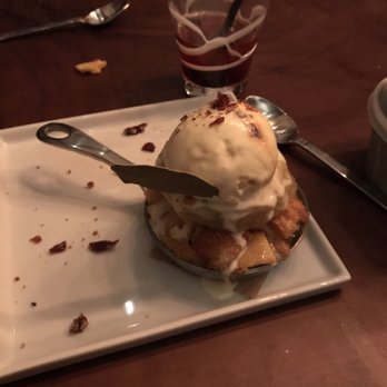 Urban Kitchen - Bread pudding topped with ice cream - New American Near Me - Bozeman, Montana Urban Kitchen - Bread pudding topped with ice cream - New American Near Me - Bozeman, Montana