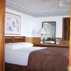 A1 Cottage Rentals - Cottage 1 queen bedroom has walk out deck overlooking Lake Huron
