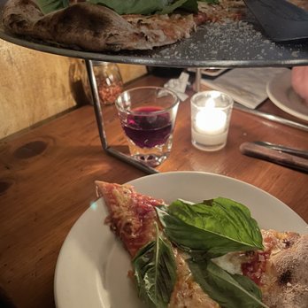 Lucali - 2 slices is usually my limit, but I inhaled half a pie on my own. - Pizza Near Me - Brooklyn, New York