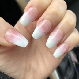 WORST nail salon ever. I have gotten my nails done for 15 years and I have never had them look this crappy. This is AFTER she fixed them!! WORST nail salon ever. I have gotten my nails done for 15 years and I have never had them look this crappy. This is AFTER she fixed them!!