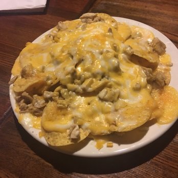 The Wild Colonial Tavern - Jerk chicken and cheese over chips, cheap eats and cheese on every chip - Pubs Near Me - Providence, Rhode Island