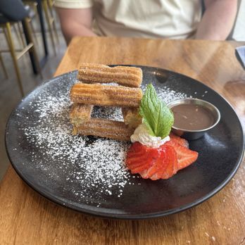 T'zunun - Churros! The chocolate sauce was so good my boyfriend literally drank it when we finished the churros. - Cocktail Bars Near Me - Pleasant Hill, California T'zunun - Churros! The chocolate sauce was so good my boyfriend literally drank it when we finished the churros. - Cocktail Bars Near Me - Pleasant Hill, California