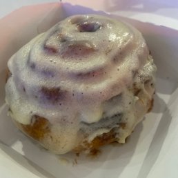a cinnamon roll in a box