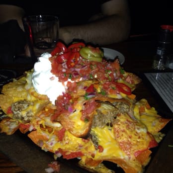 Olde Magoun's Saloon - Gigantic titan pull pork nachos!!! - Irish Near Me - Somerville, Massachusetts Olde Magoun's Saloon - Gigantic titan pull pork nachos!!! - Irish Near Me - Somerville, Massachusetts
